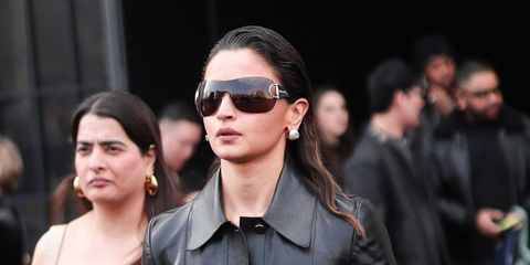 Alia Bhatt was seen wearing Gucci GG2174S 001 shield sunglasses at the Gucci Fall/Winter 2026 fashion show during Milan Fashion Week.
