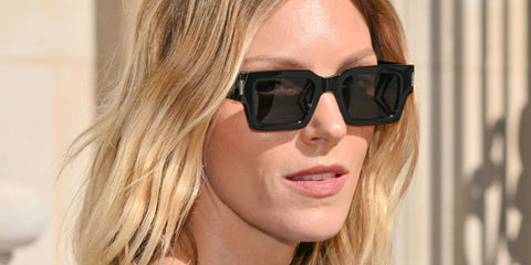Supermodel Anja Rubik was seen wearing black Saint Laurent SL 572 001 sunglasses at the Saint Laurent Menswear Spring/Summer 2026 fashion show during Paris Men's Fashion Week