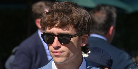 Ellie Goulding's boyfriend Beau Minniear was seen wearing black Prada PR A16S 16K731 sunglasses at the Wimbledon Tennis Championships 2026