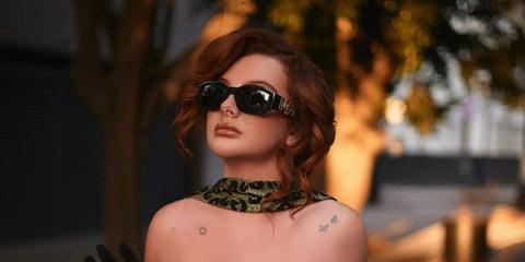 Briggitte Bozzo was seen wearing the iconic Versace 4361 GB1/87 Medusa Biggie Sunglasses in her Instagram post