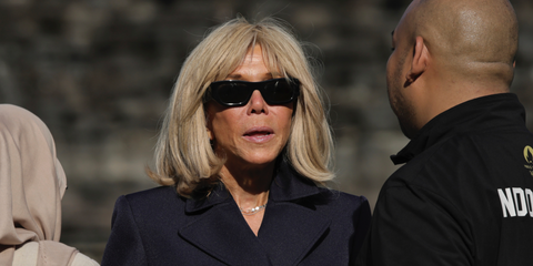 First Lady of France Brigitte Macron was seen wearing black Prada PR A01S 16K08Z sunglasses during her visit to Indonesia, May 2025