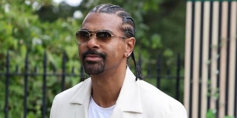 Former professional boxer David Haye was seen wearing arista gold Ray-Ban RB 3707 001/51 sunglasses with brown gradient lenses