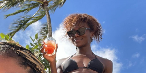 Sprinter Dina Asher-Smith was seen wearing black Saint Laurent Sun SL 276 Mica 032 cat eye sunglasses in Hawaii, shared through her Instagram post in September 2023. Shop online now on Pretavoir