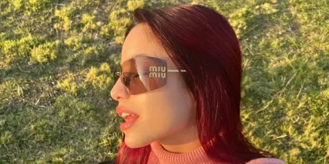 Argentine singer Emilia Mernes was seen wearing pale gold Miu Miu Rimless Runway MU 54YS ZVN20F sunglasses with brown mirror lenses in a social media post.