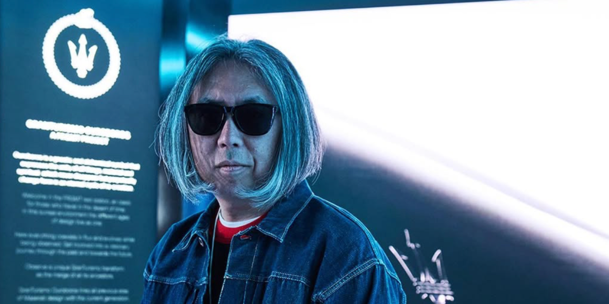Hiroshi Fujiwara was seen wearing black Oakley Frogskins OO9013 24-306 wayfarer-style sunglasses at the launch of The Maserati GranTurismo Ouroboros by Fragment, April 2023