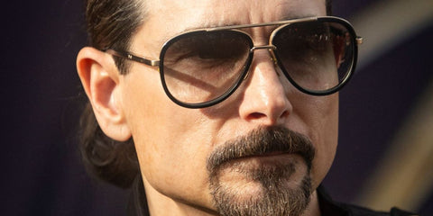 Singer and musician Kevin Richardson was seen wearing black and gold Dita Mach Two DRX 2031B 60 aviator sunglasses with brown gradient lenses at the Los Angeles premiere of Michael Jackson's biopic "Michael" in April 2026.