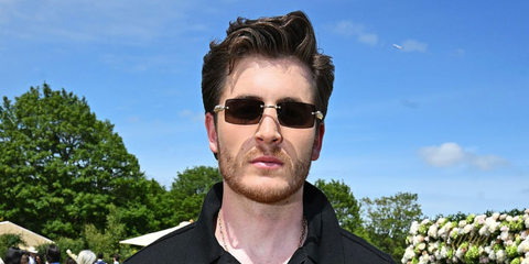 Irish actor Kieron Moore was seen wearing gold Clash de Cartier CT0604S 001 sunglasses at the Cartier Queens Polo Cup 2026 in Egham, England.