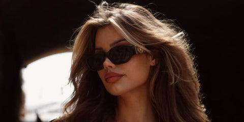 Dutch model Laura Celia Valk was seen wearing black Versace 4361 GB1/87 Medusa Biggie Sunglasses in a social media post. Shop online now on Pretavoir
