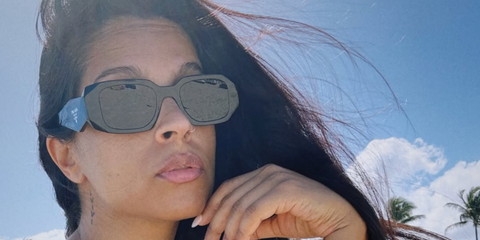 Canadian YouTuber Lilly Singh was seen wearing Prada PR 17WS 1AB5S0 Symbole Sunglasses in her Instagram post