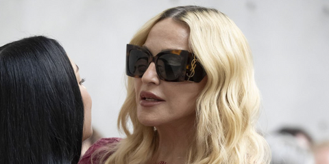 Madonna was seen wearing tortoiseshell Saint Laurent Sun Blaze SL M119 002 sunglasses at the Saint Laurent Menswear Spring/Summer 2027 fashion show during Paris Men's Fashion Week.