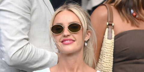 Morgan Riddle, girlfriend of tennis star Taylor Fritz, was seen wearing gold Miu Miu MU 52YS 7OE01T sunglasses with brown lenses at the Wimbledon Tennis Championships 2025. Shop online now on Pretavoir