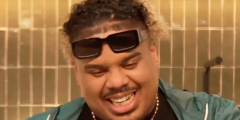 French rapper Naza was seen wearing black and white Prada PR 06YS 09Q5S0 sunglasses in his Instagram reel