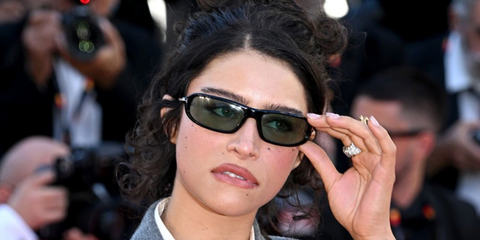 Odessa A'zion was seen wearing black Tom Ford Addison-02 TF1400 01N sunglasses with green lenses at the "Karma" screening during Cannes Film Festival 2026.