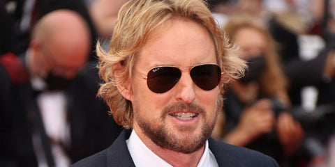 Owen Wilson was seen wearing gold Ray-Ban Aviator 3025 001/57 sunglasses with brown Polarised lenses at the 74th annual Cannes Film Festival