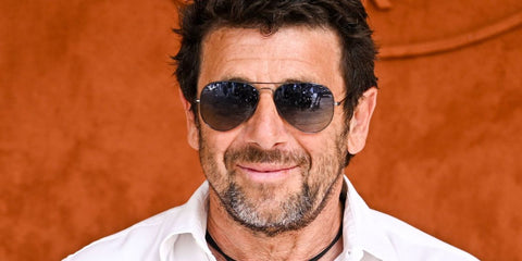 French singer and actor Patrick Bruel was seen wearing grey Ray-Ban Aviator 3025 004/78 sunglasses with Polarised Grey/Blue Gradient lenses at the 2023 French Open