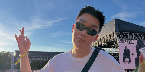 South Korean rapper Peakboy was seen wearing black Ray-Ban Daddy-O RB 2016 601/31 sunglasses in his Instagram post, August 2025.