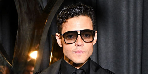 Rami Malek was seen wearing Saint Laurent Sun SL 596 Dune 001 sunglasses at the Saint Laurent Spring/Summer 2025 fashion show during Paris Fashion Week