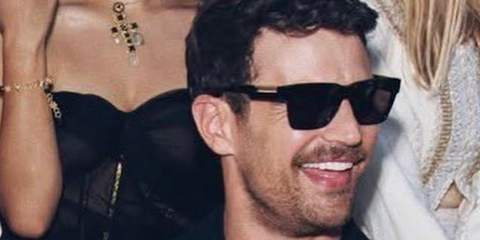 Theo James was seen wearing black and gold Dolce&Gabbana DG4465 501/87 square sunglasses at the Dolce & Gabbana Alta Sartoria fashion show in Taormina, Italy, July 2026.