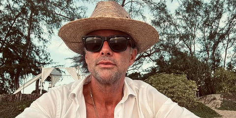 Walton Goggins was seen wearing black Oliver Peoples N.04 Sun OV5552SU 1731/P2 Polarised square sunglasses on the set of The White Lotus season 3 in Thailand