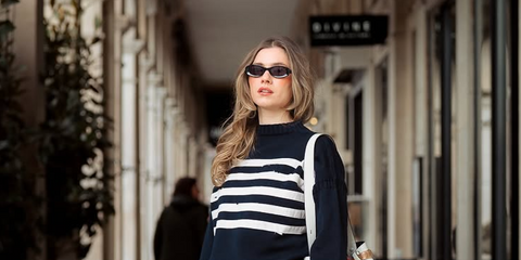 Zita D'Hauteville was seen wearing Prada PR 26ZS 16K08Z black sunglasses in her Instagram post